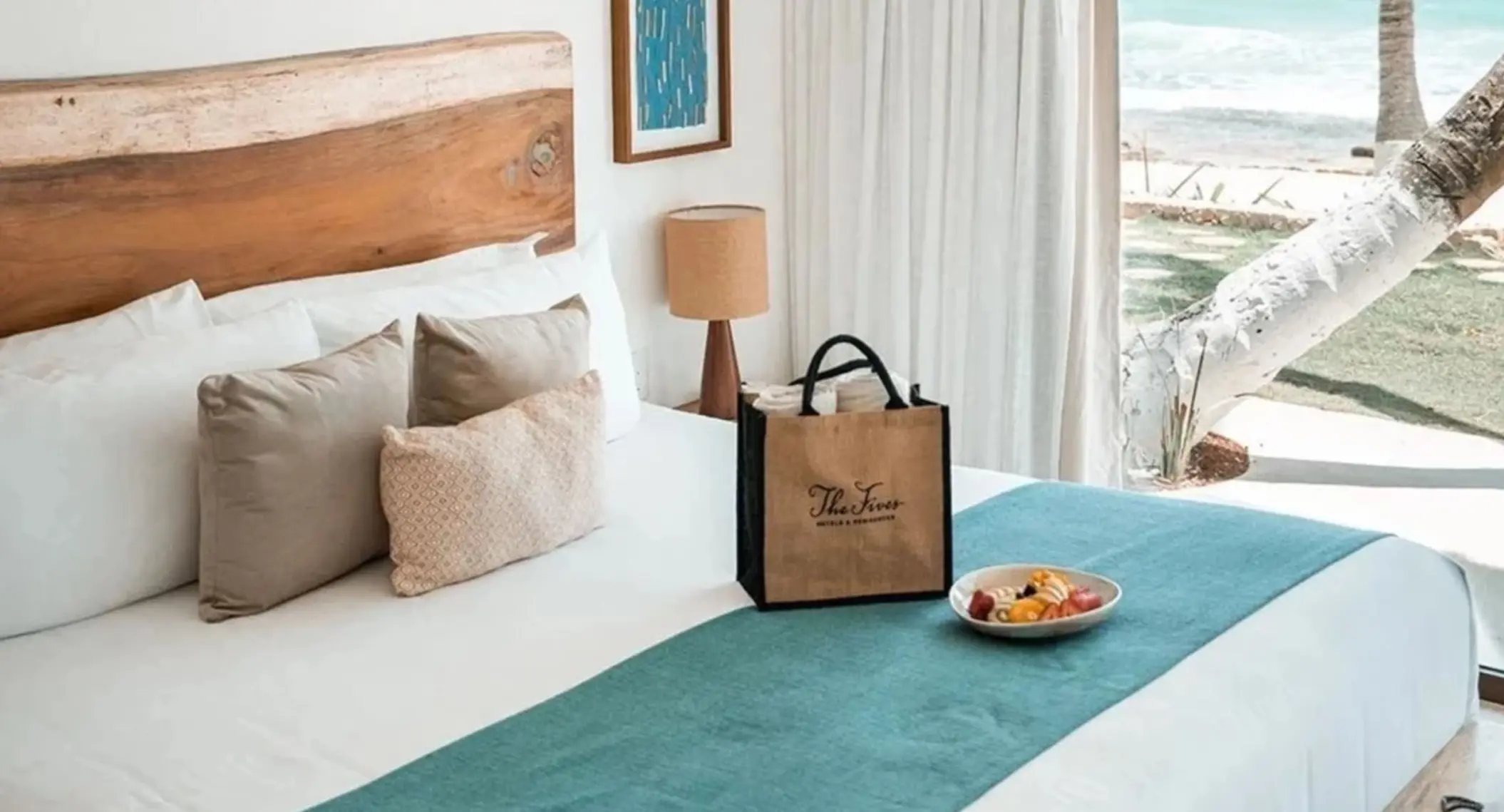 luxury suite with king bed at The Beachfront by The Fives