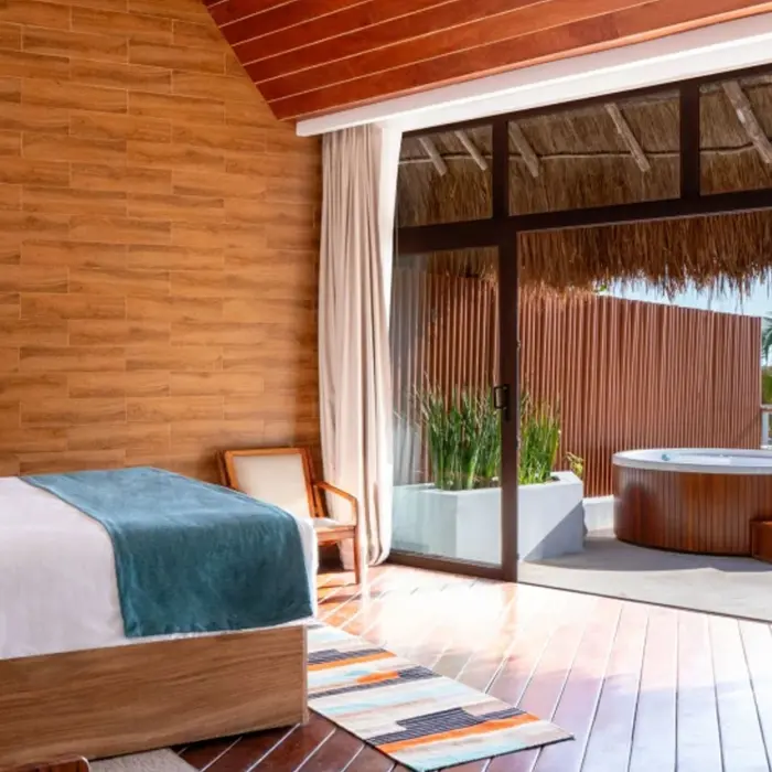 master suite with terrace hot tub at The Beachfront by The Fives