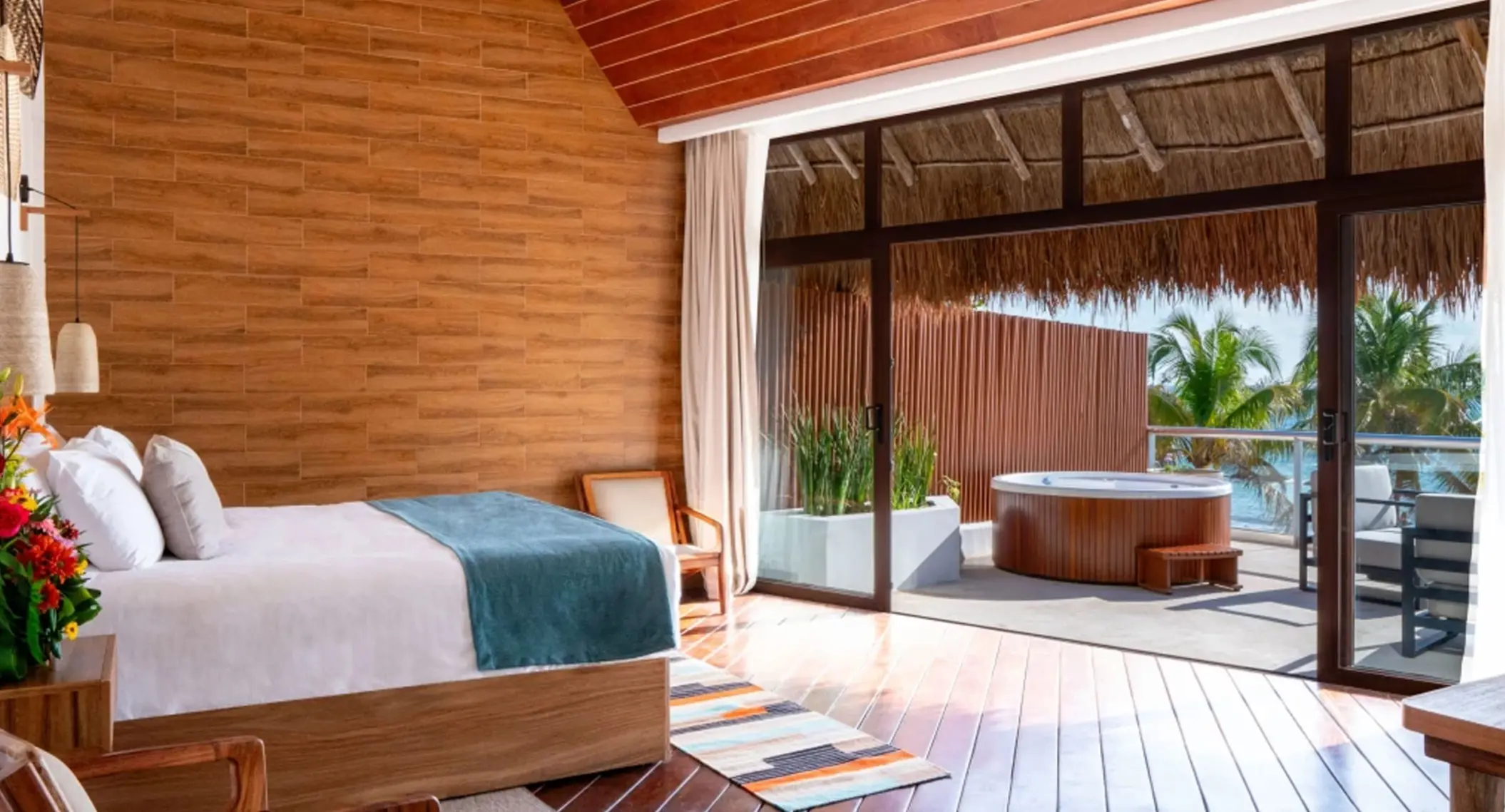 master suite with terrace hot tub at The Beachfront by The Fives
