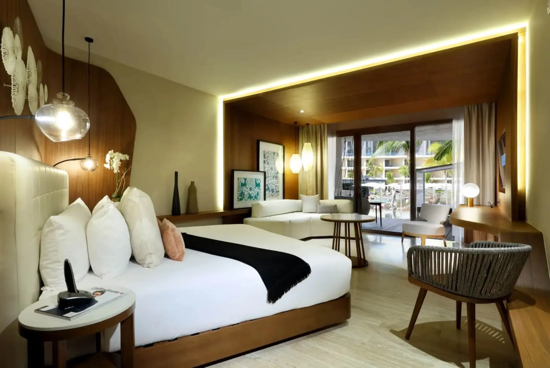 suite with king bed and garden view at trs coral hotel