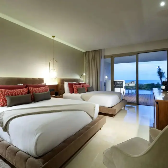 suite with two beds and ocean view at trs coral hotel