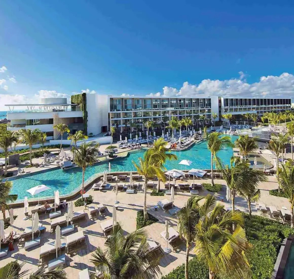 aerial view of trs coral hotel with its buildings and pools