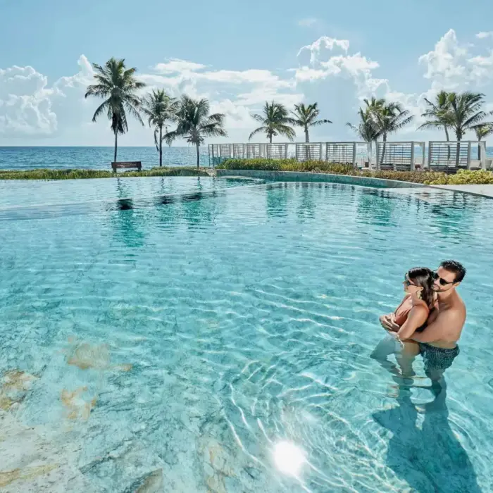couple in the oceanfront pool at TRS Yucatan Hotel