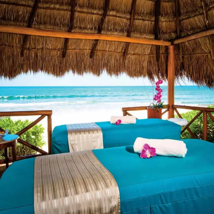 beachside massage setup at Valentin Imperial Riviera Maya
