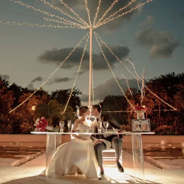 bride and groom during their reception at Valentin Imperial Riviera Maya
