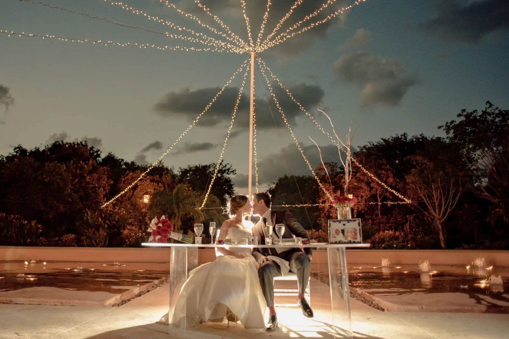 bride and groom during their reception at Valentin Imperial Riviera Maya