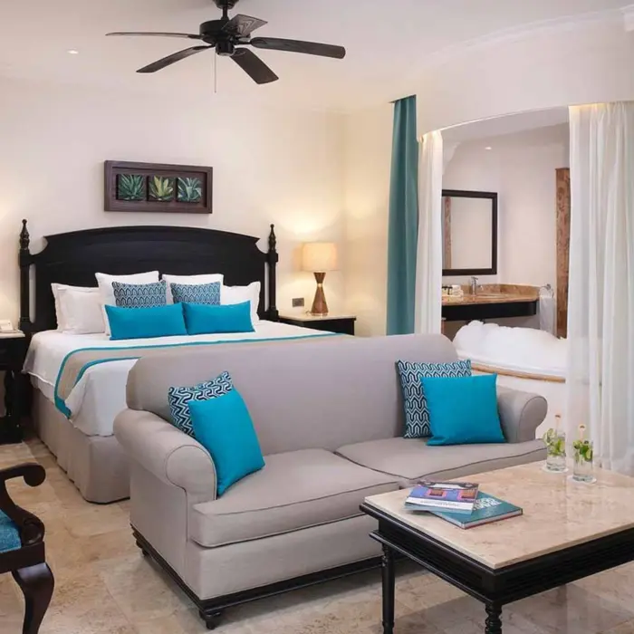 junior suite with king bed at Valentin Imperial Riviera Maya