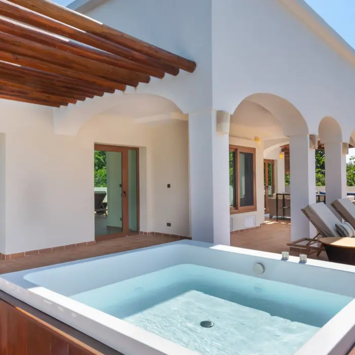 terrace of onyx suite king size with jacuzzi and loungers