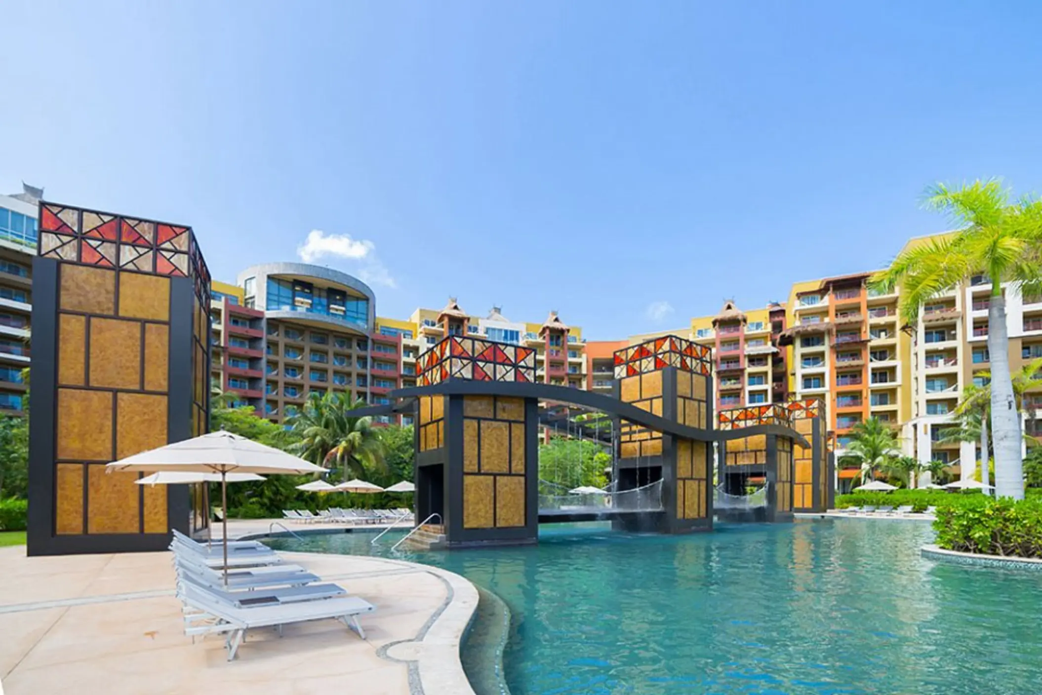 bridge waterfall pool at villa del palmar cancun