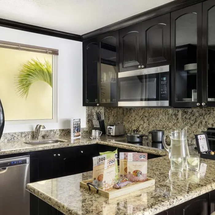 fully equipped kitchen of a suite at villa del palmar cancun
