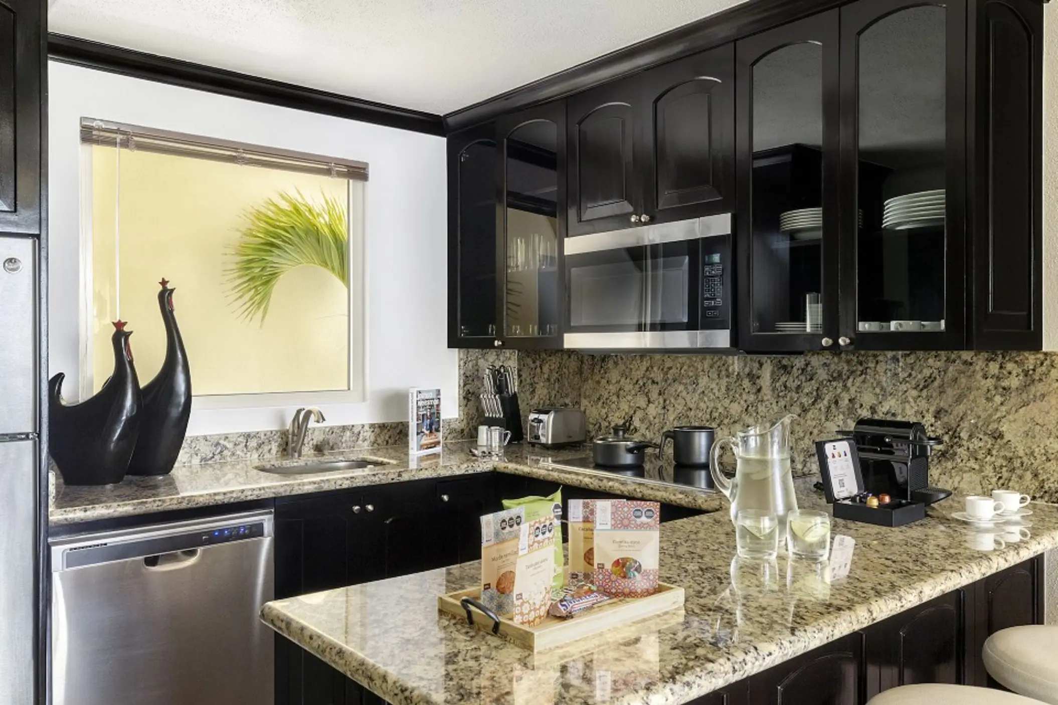 fully equipped kitchen of a suite at villa del palmar cancun