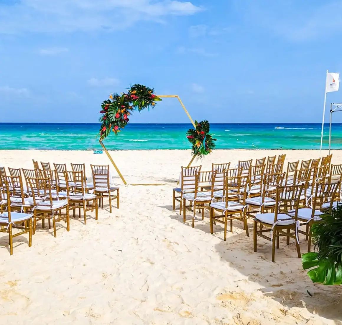 beach ceremony setup at Viva Azteca by Wyndham