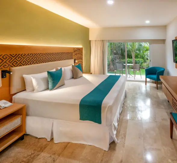 room with garden view and king bed at Viva Azteca by Wyndham