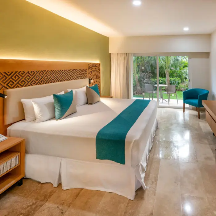 room with garden view and king bed at Viva Azteca by Wyndham