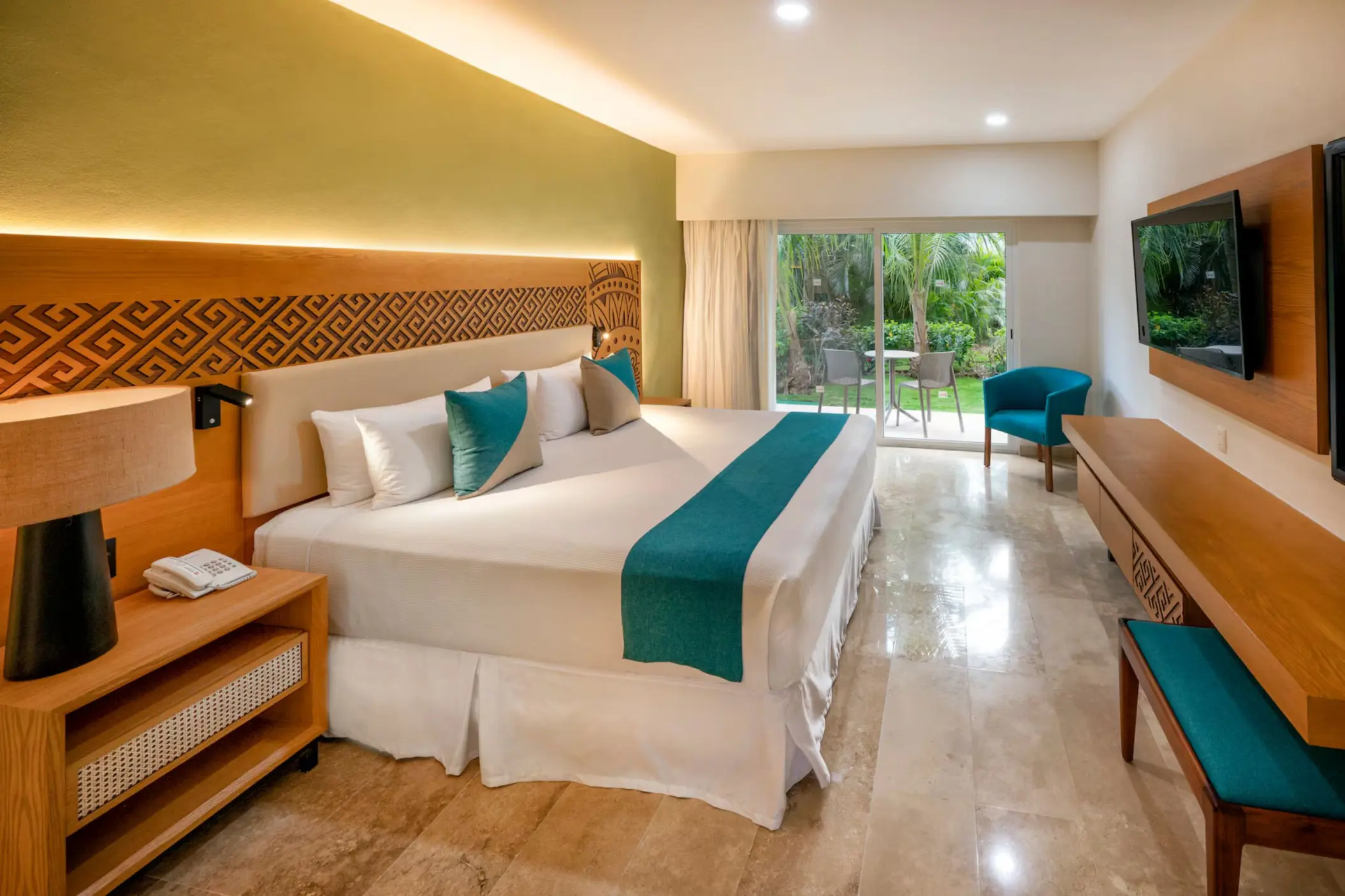 room with garden view and king bed at Viva Azteca by Wyndham