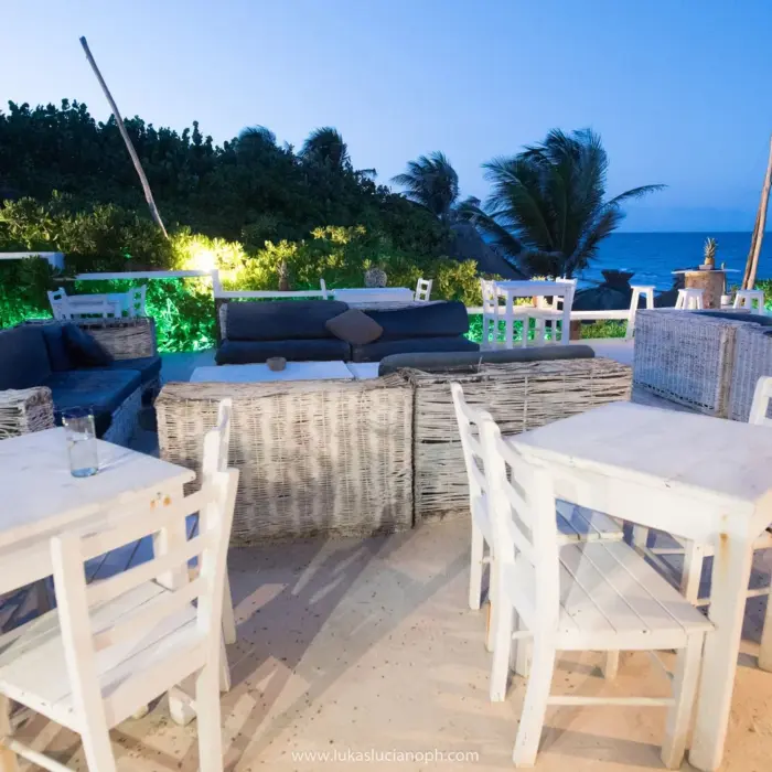 beachfront restaurant in the evening at Zulum Hotel