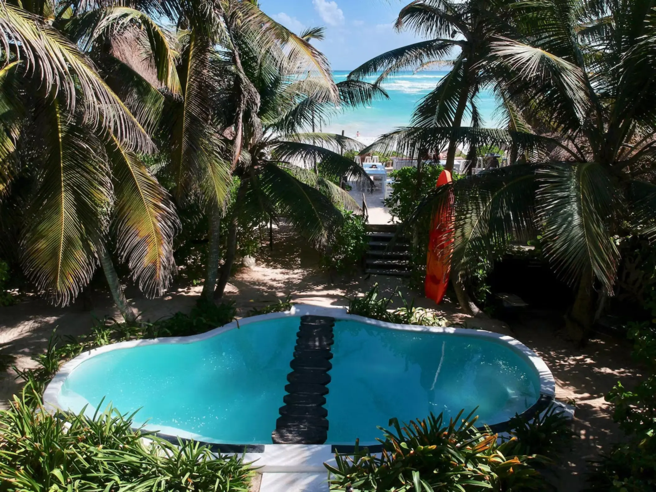 pool and beach at Zulum Hotel