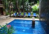 Hotel Tukan & Beach Club pool and lounge area