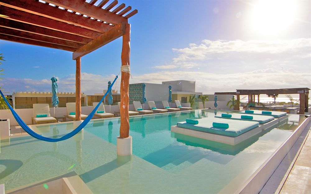 Rooftop pool area at The Palm at Playa 